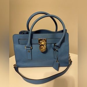 Lightly used blue Michael Kors bag